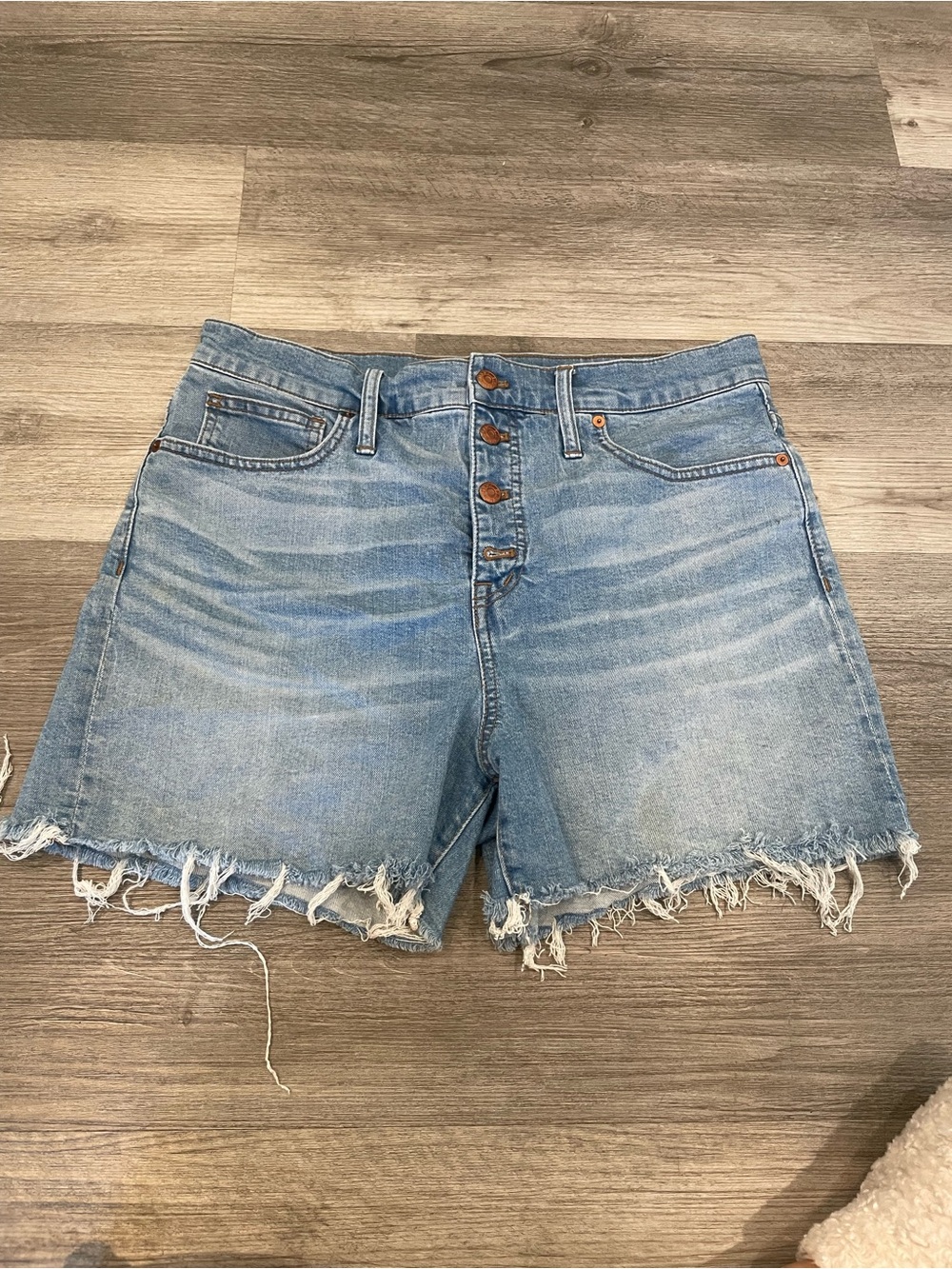 High-Rise Light Blue Denim Cutoff Shorts from the brand Madewell
